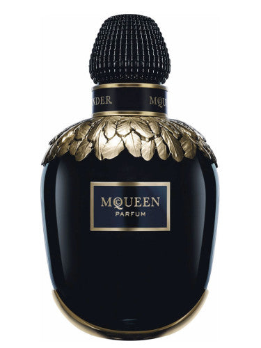 Alexander Mcqueen Mcqueen 10ml decant from Scent & Co, clear perfume vial with black cap on a light background.